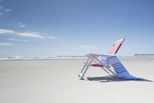 Deckchair On Empty Beach