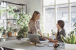 © Lumina/Stocksy - Businesswomen Working Together