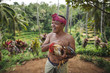 © Rob and Julia Campbell/Stocksy - Happy Balinese man in traditional clothing