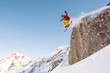 © RG&B Images/Stocksy - Extreme skier jumping from a high cliff