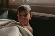 © Rob and Julia Campbell/Stocksy - Wet kids on the couch after a bath