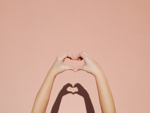Hands Making A Heart Sign.