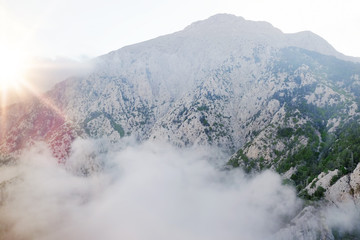 Sticker - Beautiful foggy mountains at sunrise