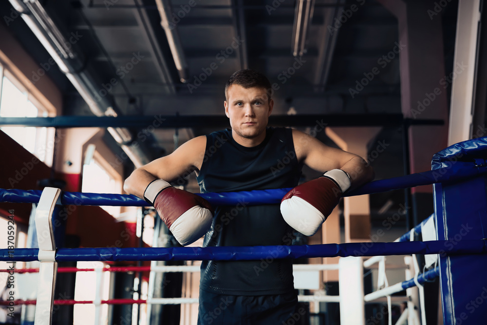 Young man in boxing ring