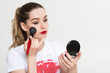 © masyuk1989 - girl makeup artist on white background