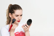 © masyuk1989 - girl makeup artist on white background