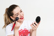 © masyuk1989 - girl makeup artist on white background