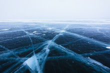Beautiful Ice With Cracks On The Lake Baikal.