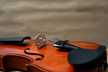 Close View Of A Violin Strings And Bridge