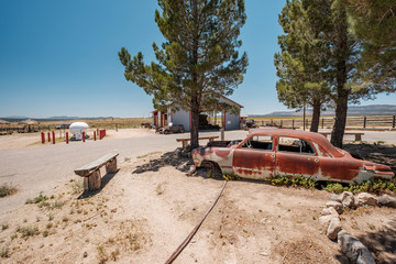 Wall Mural - Old car near historic route 66 in California