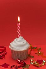 Cute Cupcake  With Burned Candle And Confetti Red  Background