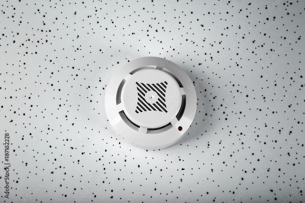Smoke detector on light background