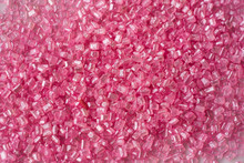 Closeup Of A Pile Of Pink Sugar Crystals (cake Decor), From Above