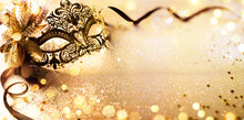 Venetian Golden Mask On Shiny Defocused Background
