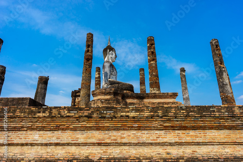 Fotografie, Obraz Ancient Buddha Statue world heritage site Sukhothai historical park
