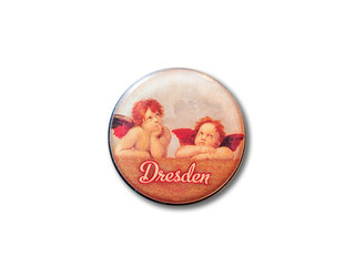 Wall Mural - Dresden souvenir refrigerator magnet with the Angels of Raphael painting isolated on white background