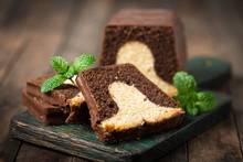 Homemade marble pound cake on a wooden board