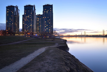 Canvas Print - Coast of Neva river at sunset.