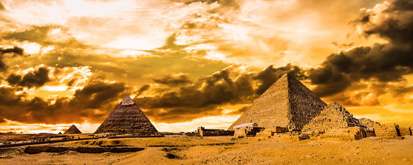 Wall Mural - Great Pyramids of Giza, Egypt, at sunset