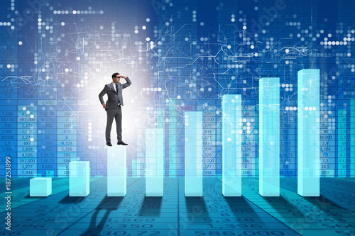 Fotomural Businessman looking far in economic forecasting concept