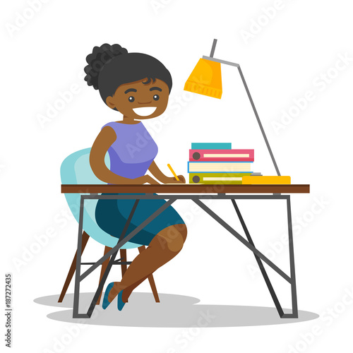Young African American Business Woman Sitting At The Desk And