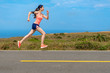 © PR Image Factory - side view photo of professional female runner