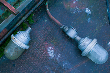 Two inactive street lights from area of abandoned factory.