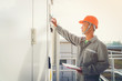 © only_kim - solar power plant to innovation of green energy; engineer or electrician working on checking and maintenance equipment at solar power plant