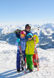 © oksanatrautwein - Happy family enjoying winter vacations in mountains . Ski, Sun,Snow and fun.