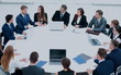© ASDF - Business people in a conference room.