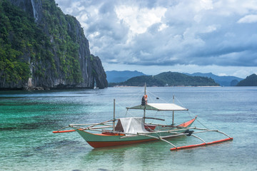 Small bangka boat on the bay of El Nido, Philippines