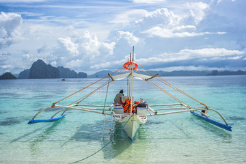 Small bangka boat on the bay of El Nido, Philippines