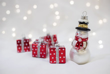 Christmas Decorations With Snowman Toy And Present Box. Christmas And New Year Concept