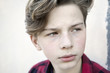 © James Ross Photography/Stocksy - Teenagers face in closeup