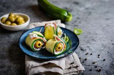 Wall Mural - Rolled zucchini slices stuffed with bacon, cream cheese and olive