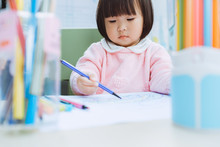 Cute Asia Little Girl Learning Drawing