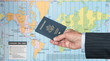© steheap - USA Citizen with passport and world map of timezones