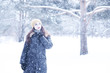 © alexkich - Beautiful girl in a beautiful winter snow
