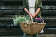 © BONNINSTUDIO/Stocksy - Cropped view of a mature woman on a farm.