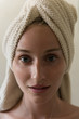 © Milles Studio/Stocksy - Woman with towel on her head