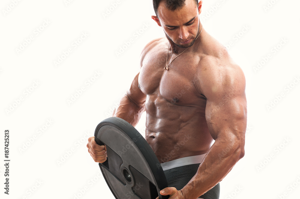 Muscular bodybuilder man with six pack abdominal, perfect trained body ...