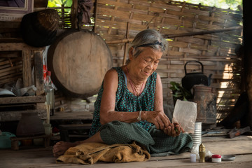 Old woman living in the countryside .