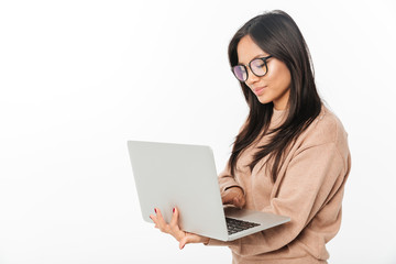 Sticker - Asian smiling woman wearing glasses using laptop