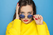 © vladimirfloyd - beautiful woman with blue sunglasses and yellow blouse