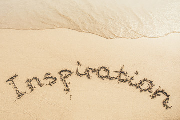 Wall Mural - Inspiration text written on the sand