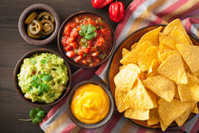 Mexican Nachos Tortilla Chips With Guacamole, Salsa And Cheese Dip