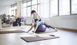 © Lumina/Stocksy - Senior Woman Doing Exercise With Pilates Ball