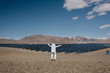 © Alexandr Ivanets/Stocksy - Person in special suit and solar batteries