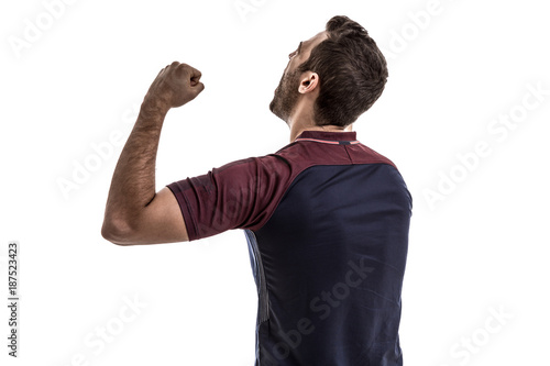 Fotomural Soccer fan celebrating on white background