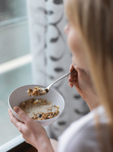Woman Eating A Cereal